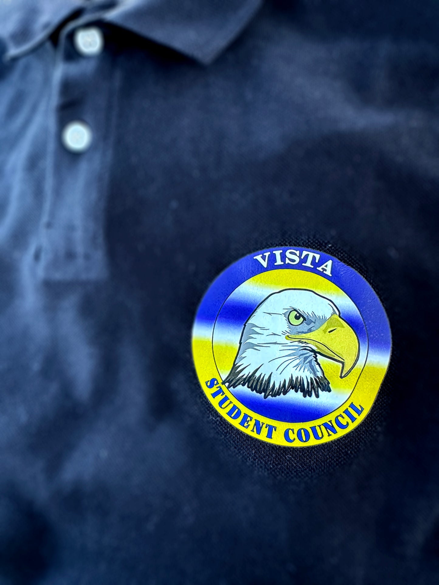 Individual Vinyl Pressings onto Black Polo shirts for Vista Student Council